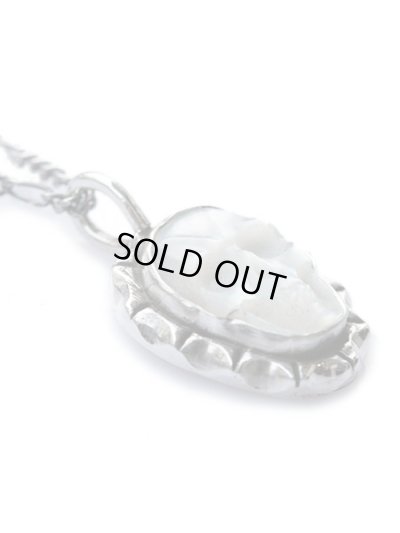 ジョニーデップ愛用アクセサリー「リーダウニー」スカルペンダント（マザーオブパール）